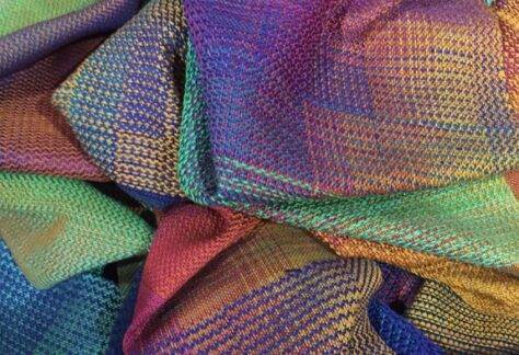 a pile of colorful fabrics