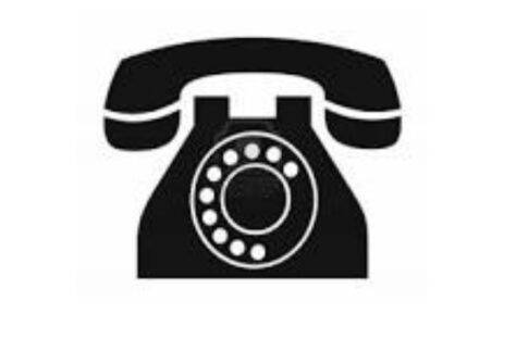 Icon of a rotary telephone in black